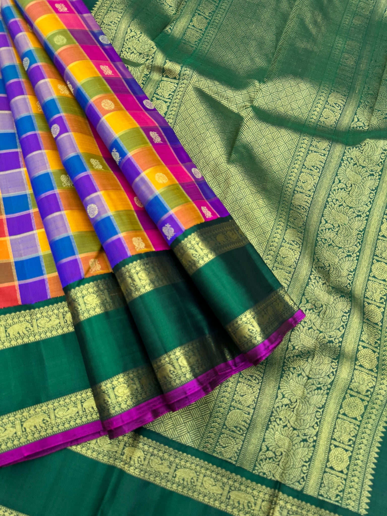 Paalum palamum kattam on Kanchivaram - a one of a kind blue pink mustard chex with bottle green vintage borders pallu and blouse