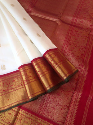 Meenakshi Kalayanam - Authentic Korvai Kanchivarams - one of a kind off white and red witb solid gold zari woven borders and pallu