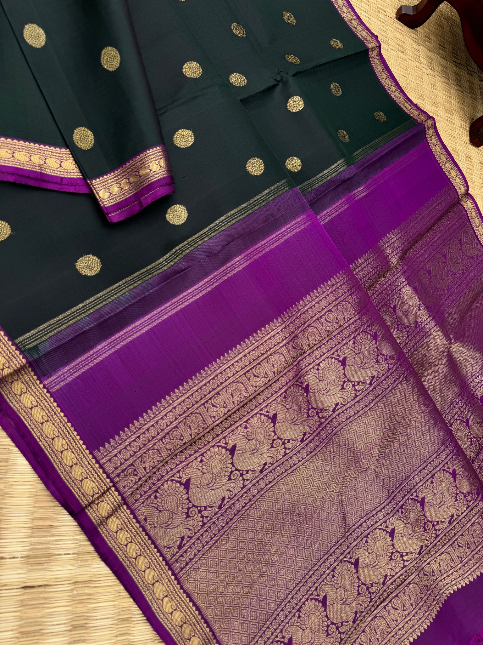Leela - The bliss of small border Kanchivarams - dark deep intense karum pachai with majentha pallu and blouse