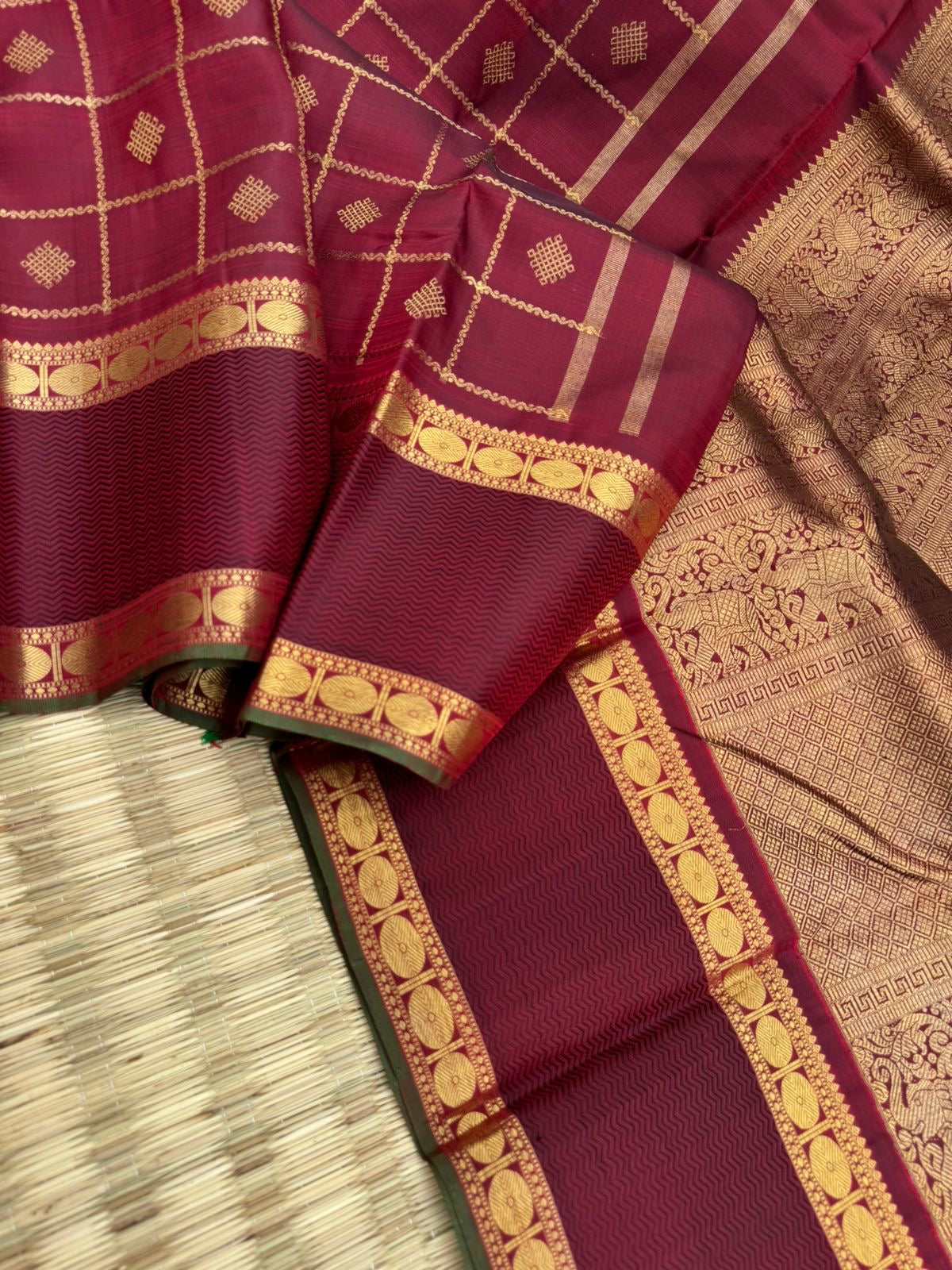 Annapoorani - the gorgeous deep maroon and gold with veldhari kolam buttas woven body with retta pett woven borders