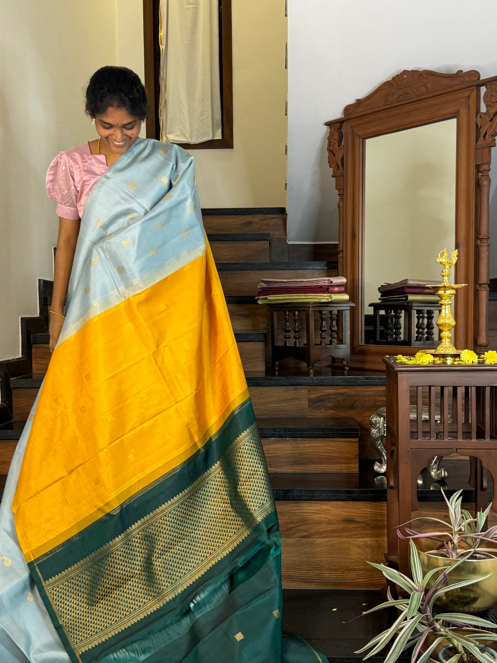 Mohaa - Beautiful Borderless Kanchivaram - pastel baby blue witb paisley and annam buttas with double pallu concept with bottle green blouse