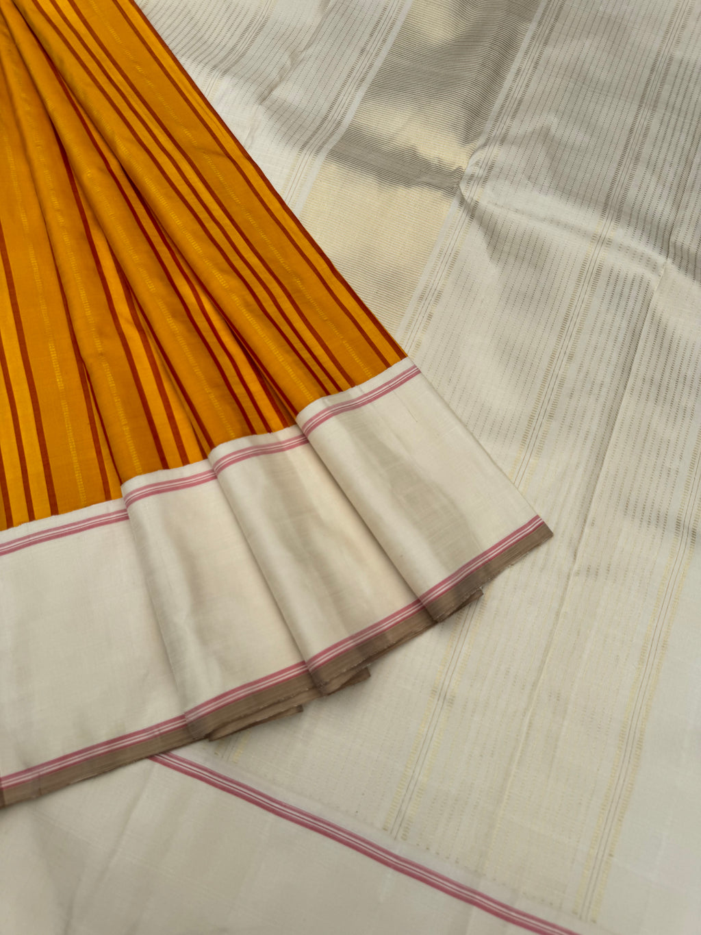 Diwali Edits - Soulful Kanchivaram - absolutely brilliant mustard with red and gold zari strips woven body with off white borders pallu and blouse