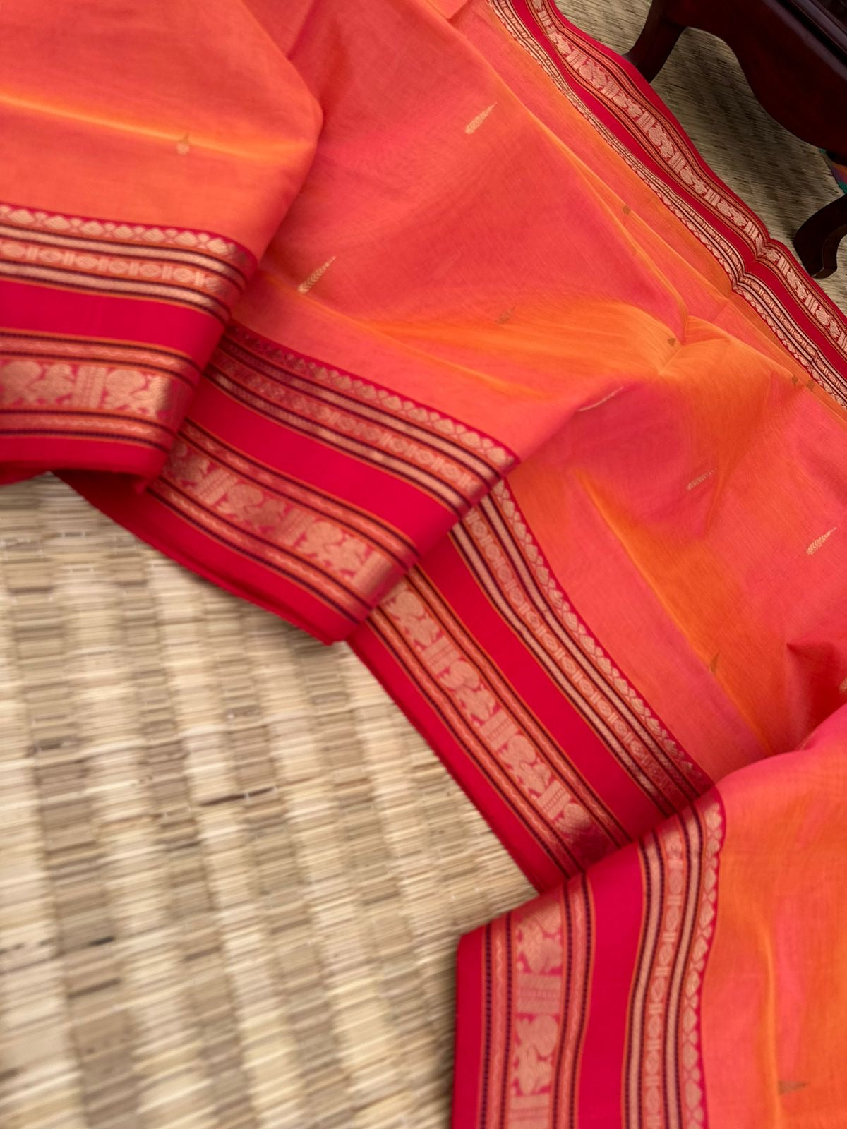 Zari Kissed Silk Cotton - a peach kanakambaram rain drop woven buttas