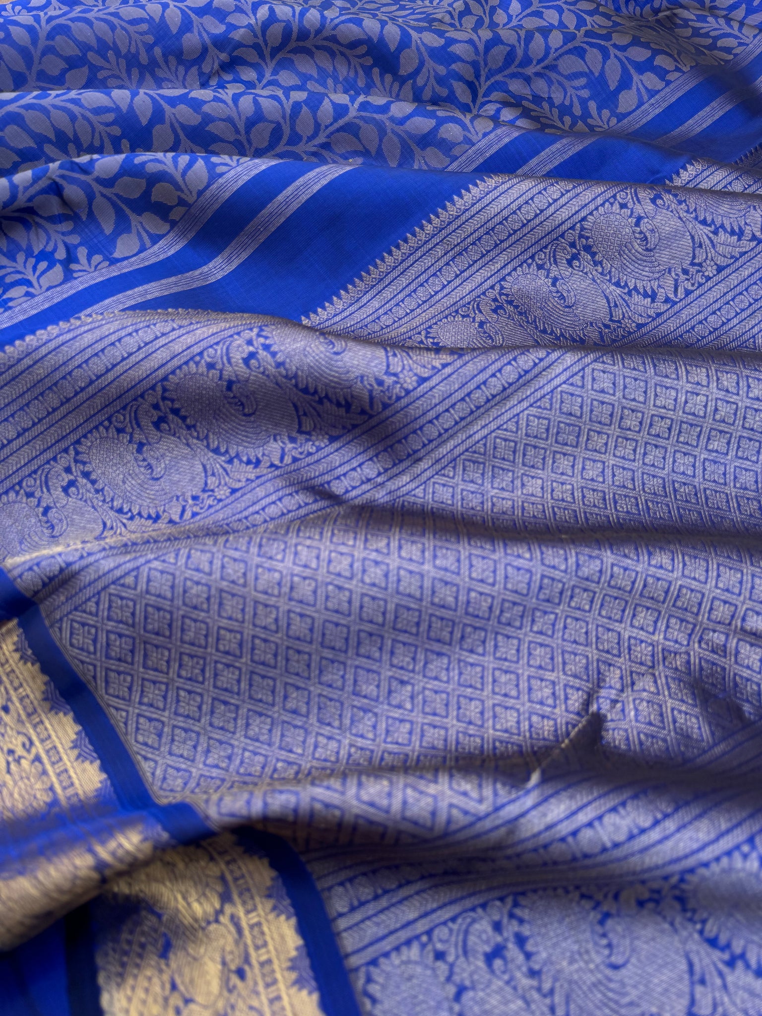 Haritham - Heirloom Yarn Play on Kanchivaram - stunning royal blue with full body woven leaves with gold zari woven borders and pallu