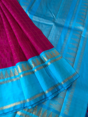 Kattams on Kanchivarams - the deep majenta and sulphate blue korvai woven muthukattam