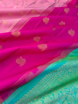 Uniquely Woven Kanchivarams - baby pink Mayil chackaram woven body with rain pink and aqua two colour woven long pallu