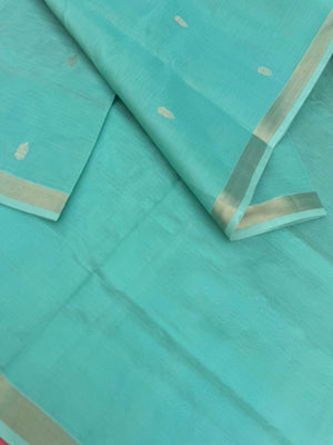 Pastels on Zari Kissed Silk Cotton - a pastel mint green with one inch tissue borders