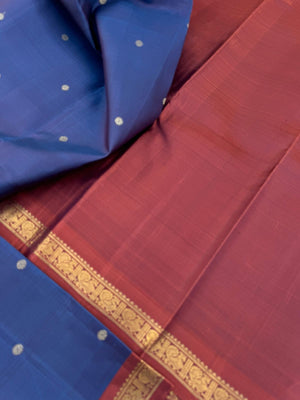 Leela - The bliss of small border Kanchivarams - rusty blue a unusual and rare tone with gorgeous chocolate tone pallu and blouse