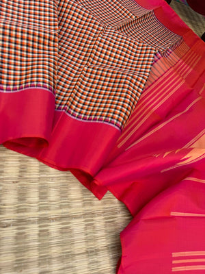 Rarest Korvai Kanchivaram - the body has tiny off white, orange, black chex with orange mixed pink Korvai woven borders