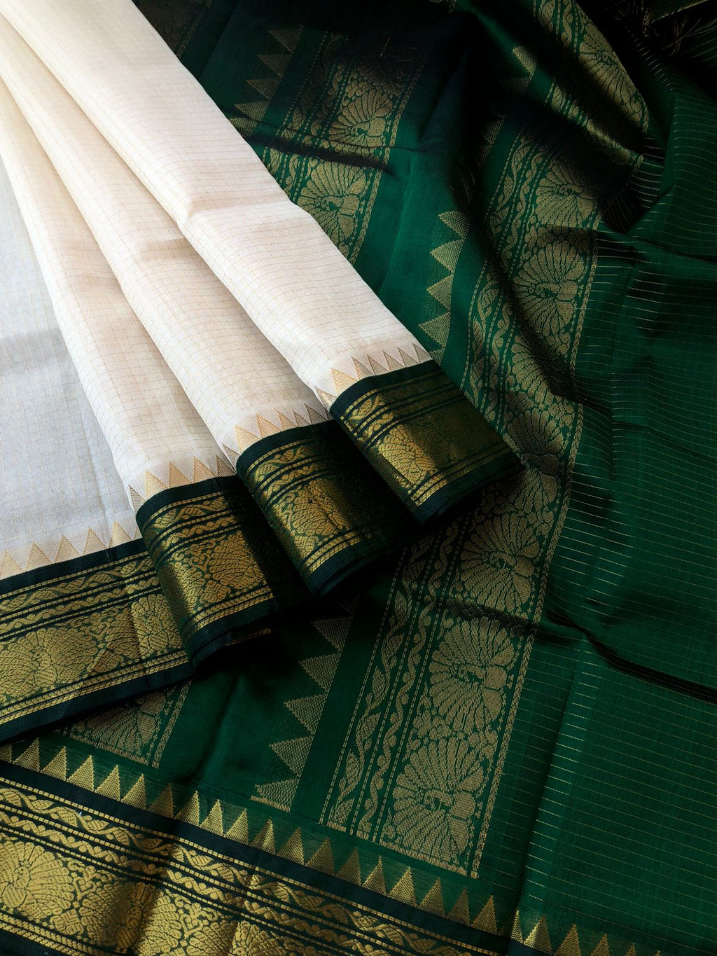 Korvai Silk Cottons - creamy off white and Meenakshi green zari kattam woven body