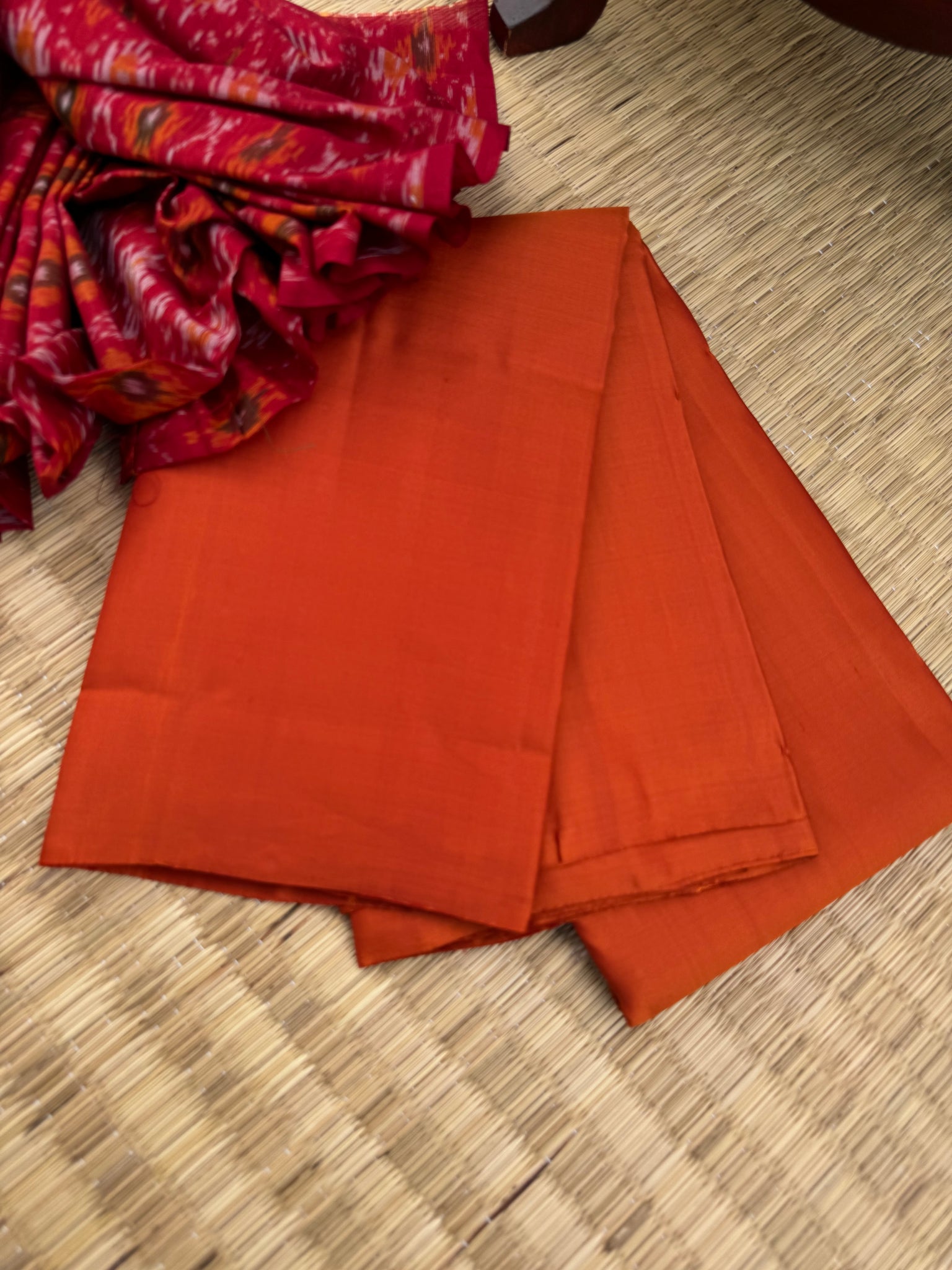 Niram - Celebrating of Full Plain Kanchivaram Silks Paired with Beautiful Blouses - rust orange saree with silk ikkat dark red blouse
