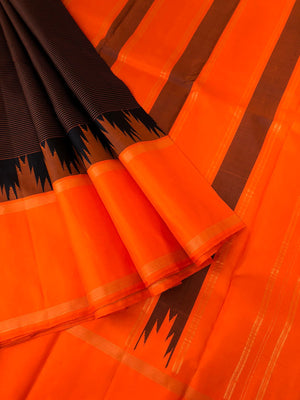 Connected by Korvai on Kanchivaram - a beautiful black stripes body with orange and pink ganga jammuna woven borders