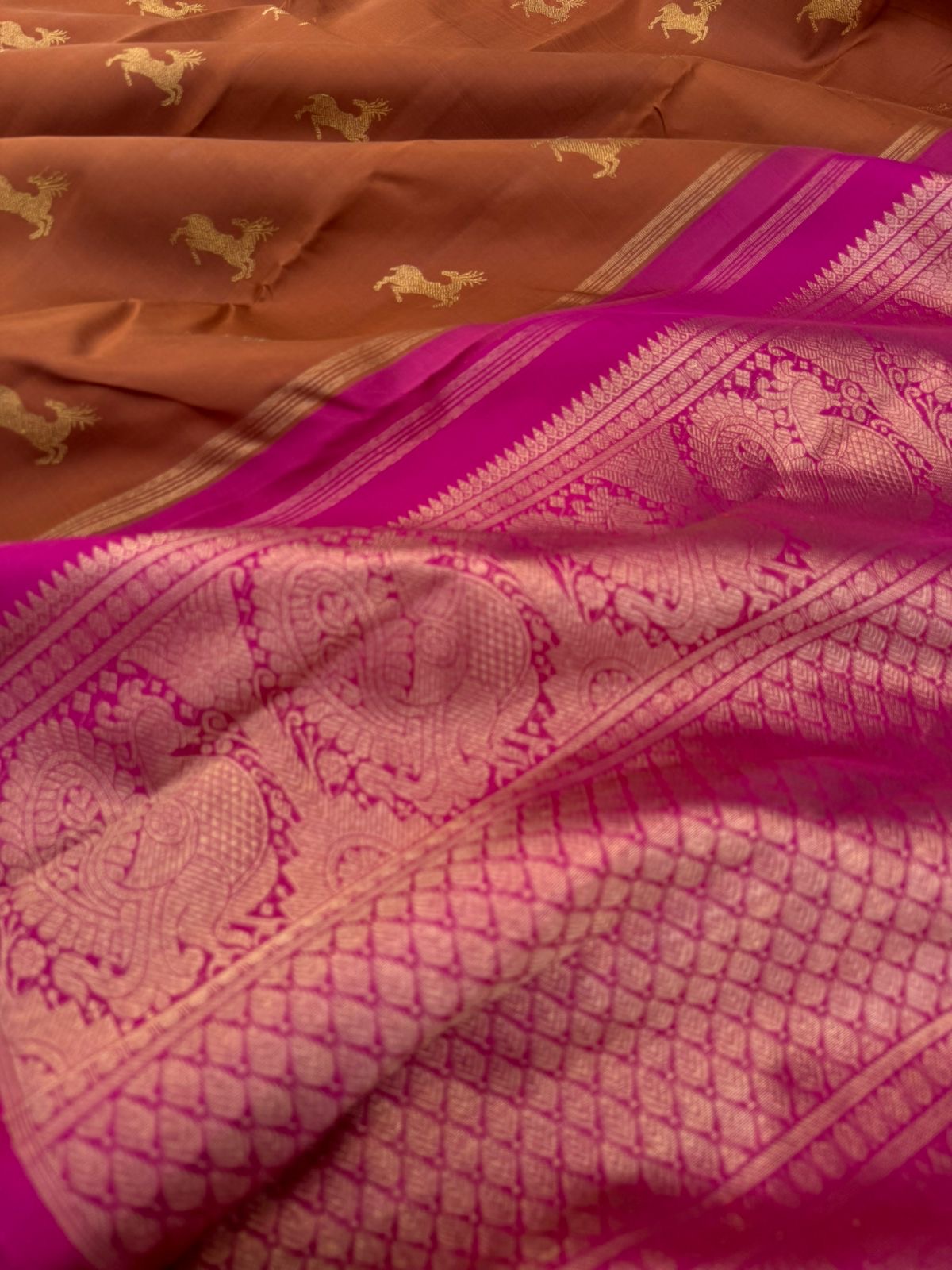 Corporate Kanchivarams - a caramel brown and pink borderless deer buttas