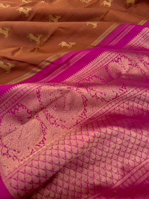 Corporate Kanchivarams - a caramel brown and pink borderless deer buttas