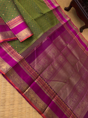 Vintage Ragas on Kanchivaram - the one of a kind deep algae green mat chexs woven body with vintage style woven borders