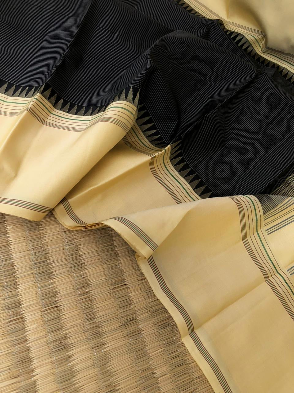 Kaavyam on Korvai Kanchivaram - the vintage beauty of black and cream off white ( venn pattu ) borders pallu and blouse
