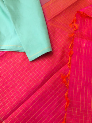 Mohaa - Beautiful Borderless Kanchivarams - stunning pastel pista green plain body with orangish pink zari chexs pallu and blouse