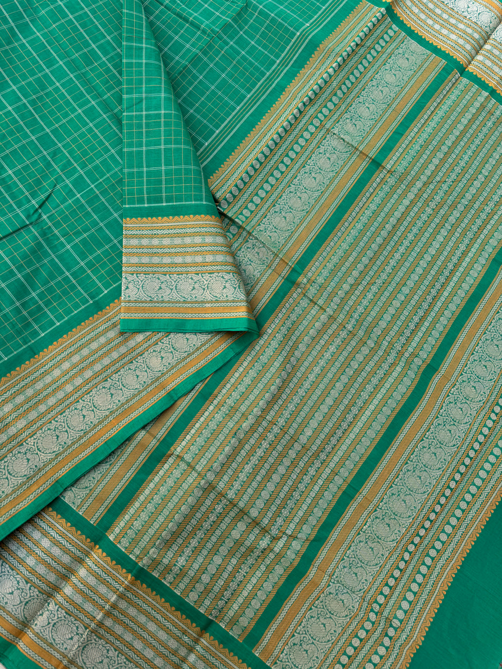 Mangalavastaram - leafy green kattam woven body with grand borders