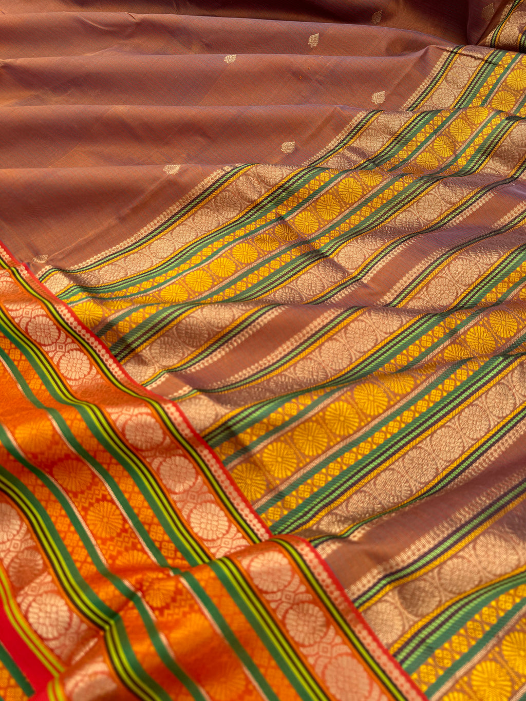 Zari Kissed Silk Cotton - a caramel mustard dual tone varusai pett woven border