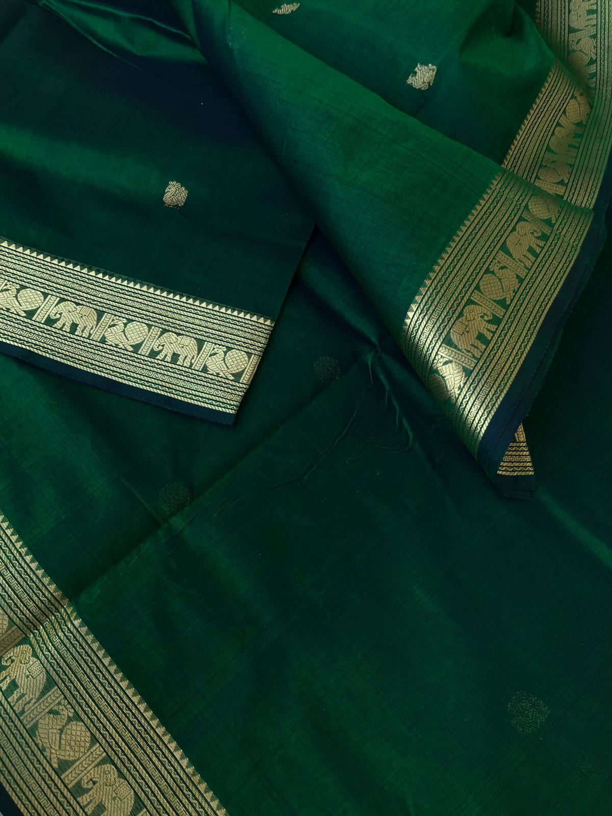 Zari Kissed Silk Cotton - the most traditional Meenakshi green with elephant and annapakshi woven borders