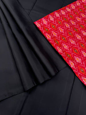 Niram - Celebrating of Full Plain Kanchivaram Silks Paired with Beautiful Blouses - black saree with red ikkat silk blouse