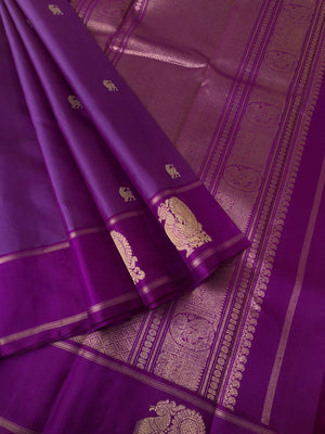 Heriyae - Heirloom Kanchivarams - a stunning metallic violet purple short with annapakshi woven border buttas with yali and chackaram woven body buttas