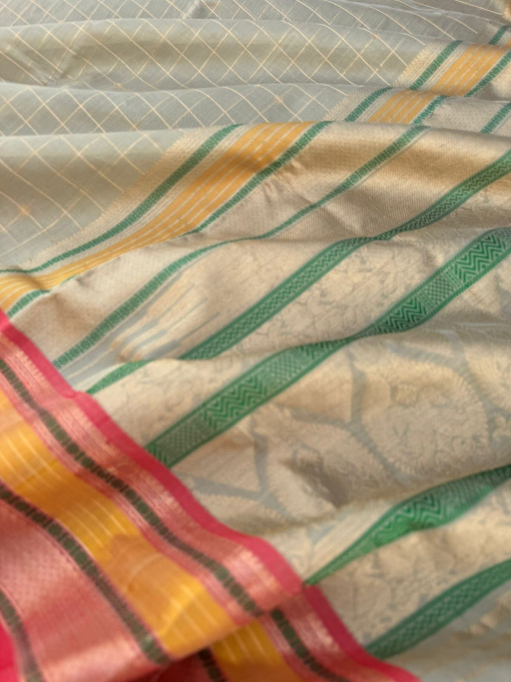 Pastels on Zari Kissed Silk Cotton - a unique unusual grey gold with different colours woven borders