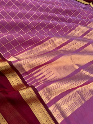 Zari Kissed Silk Cotton - a deep blackcurrant tone muthukattam with retta pett woven borders