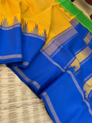 Rarest Korvai Kanchivaram - mango yellow with stripes woven body with ms blue and green ganga jammuna woven korvai borders