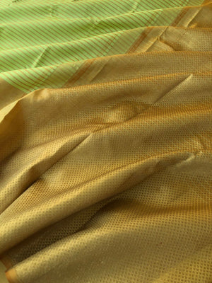 Meenakshi - Heirloom Kanchivaram - pastel pista ice cream and mustard broad woven Lakshadeepam borders with body zari stripes