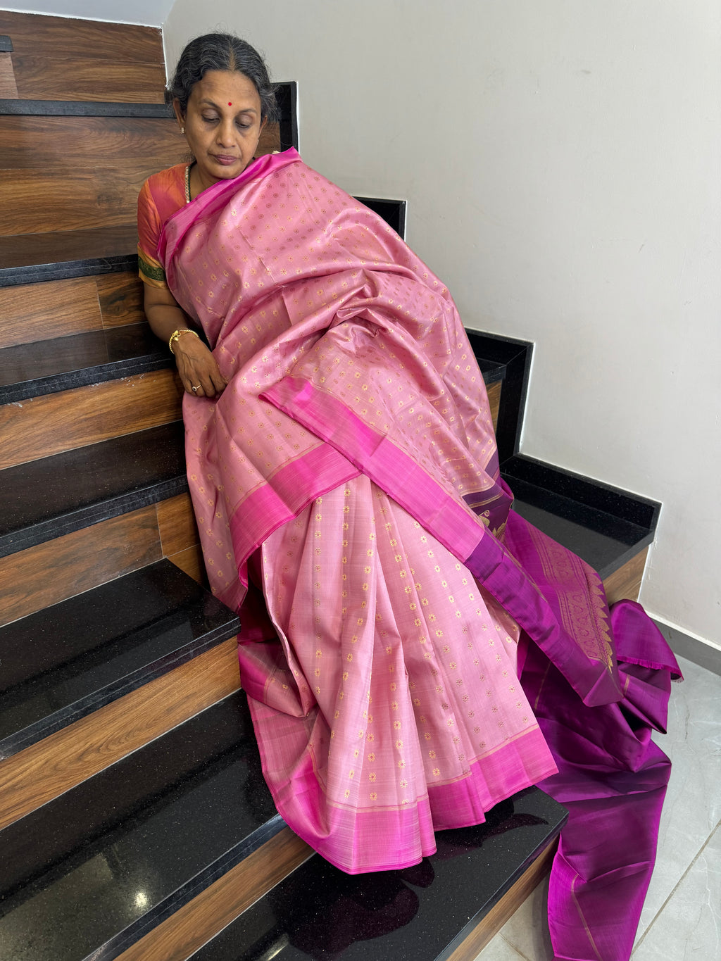 Kanchivaram Concepts - a gorgeous gorgeous baby pink full body meenakari gold zari buttas with majentha pallu and blouse