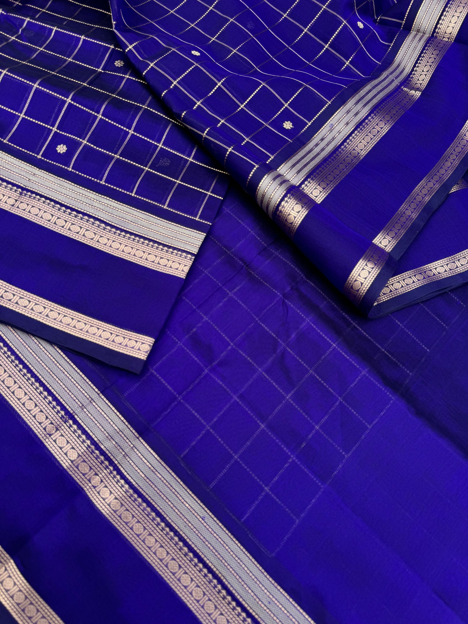 Zari Kissed Silk Cotton - a deep dark ink blue muthukattam with traditional moopula woven borders