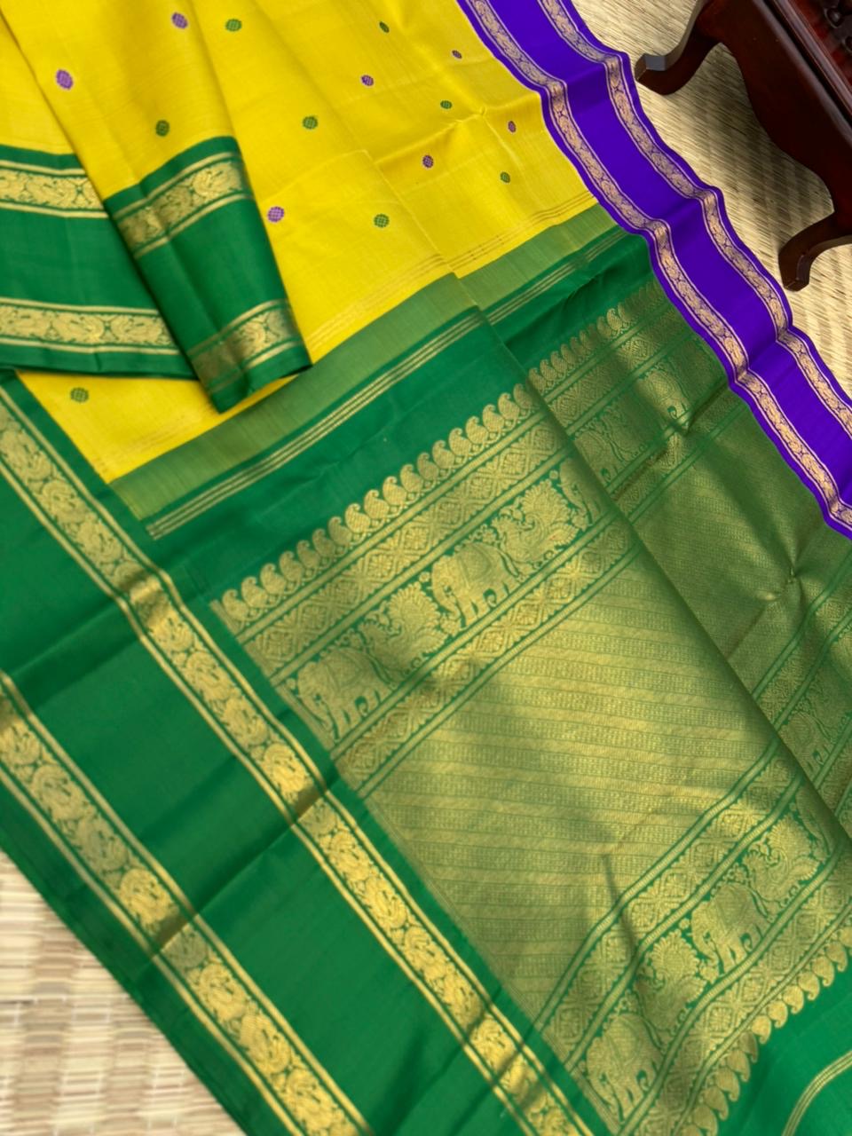 Vintage Ragas on Kanchivaram - a much loved sampanga yellow korvai Kanchivaram with retta pett ganga jammuna korvai borders with silk buttas woven body