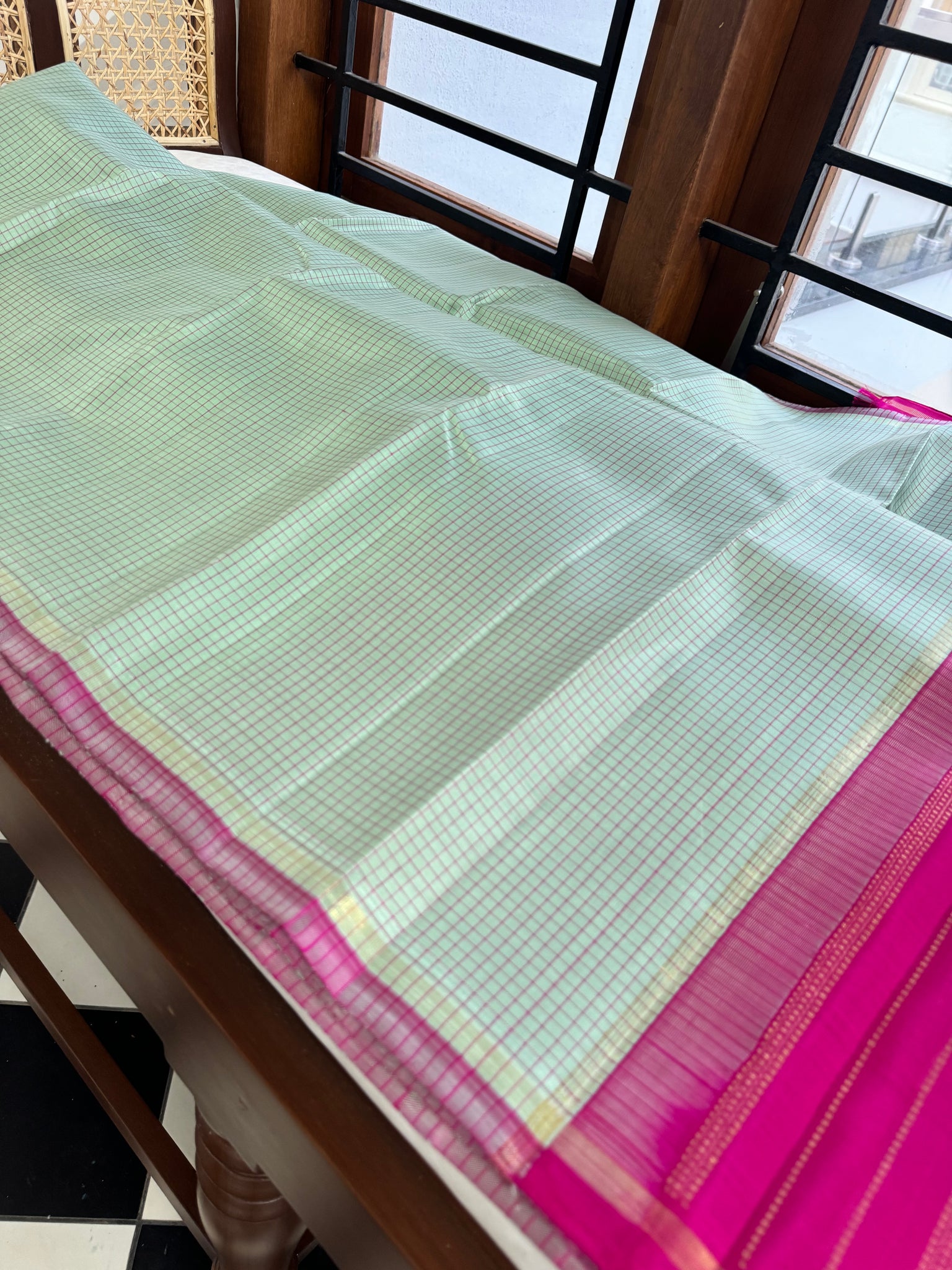 Adhyayam – The No Motifs Kanchivaram - a stunning pastel pista green podi kattam with rain pink pallu and blouse