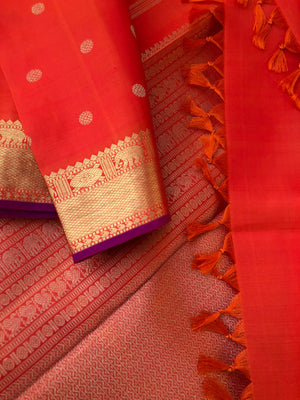 Swarnam - The Solid Kanchivarams - most beautiful traditional Kanchivaram orange and getti pett woven borders