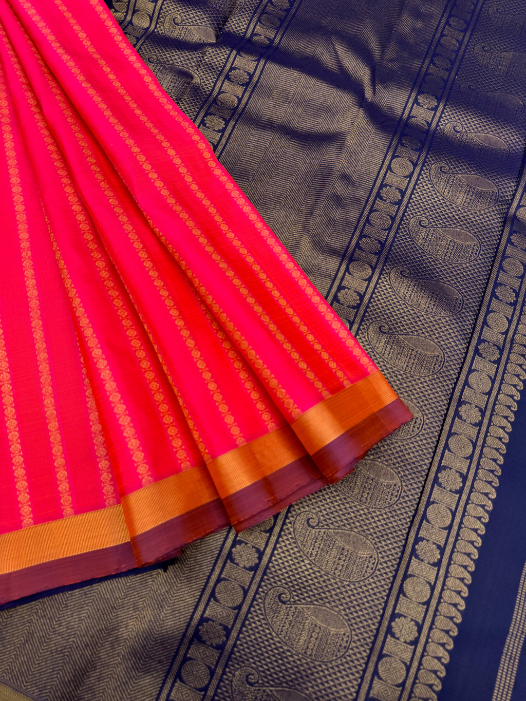 Album Untouched - a stunning orange mixed pink dual tone rudurakasham woven vertical veldhari with deep navy blue pallu and blouse