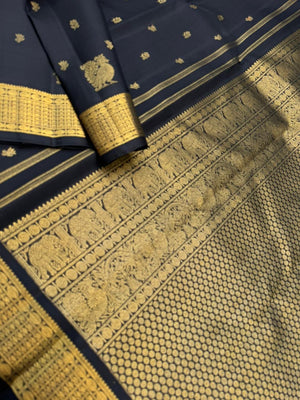 Vintage Ragas on Kanchivaram - a rarest gem of this collection, a full black and gold with old charm bettu buttas woven borders