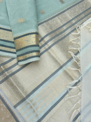 Pastels on Zari Kissed Silk Cotton - pastel pista green best part is the body has a invisible strips will give a gorgeous look when draped