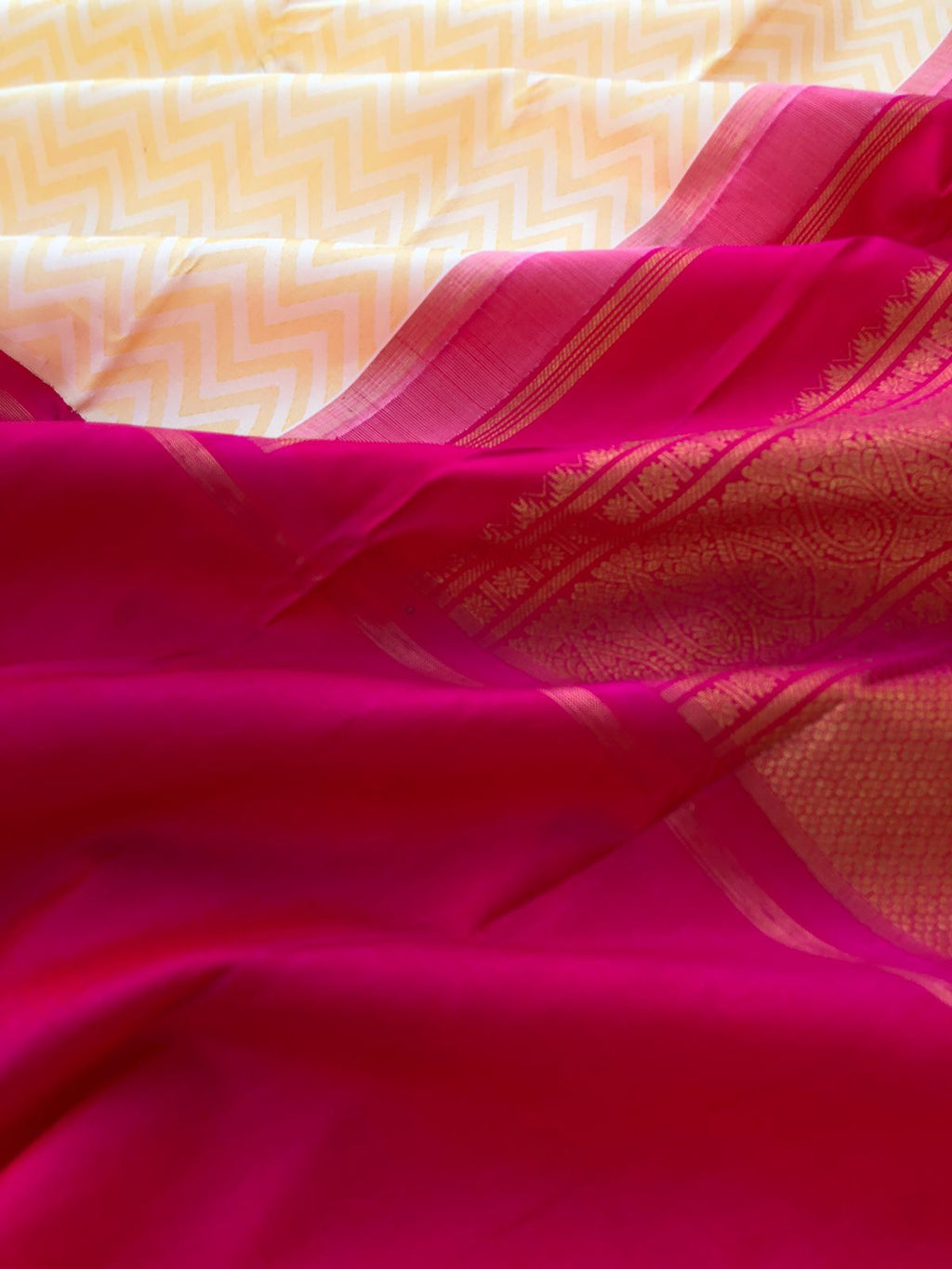 Leela - Legacy Of Kanchivarams - butterscotch cream chevron V pattern weave woven body with deep Indian pink broad woven borders