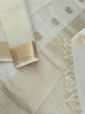Pastels on Zari Kissed Silk Cotton - the most beautiful off white/cream and gold with annapakshi woven buttas