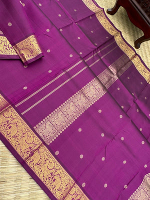 Parvathi - deep dark majentha purple with horse and elephants woven borders