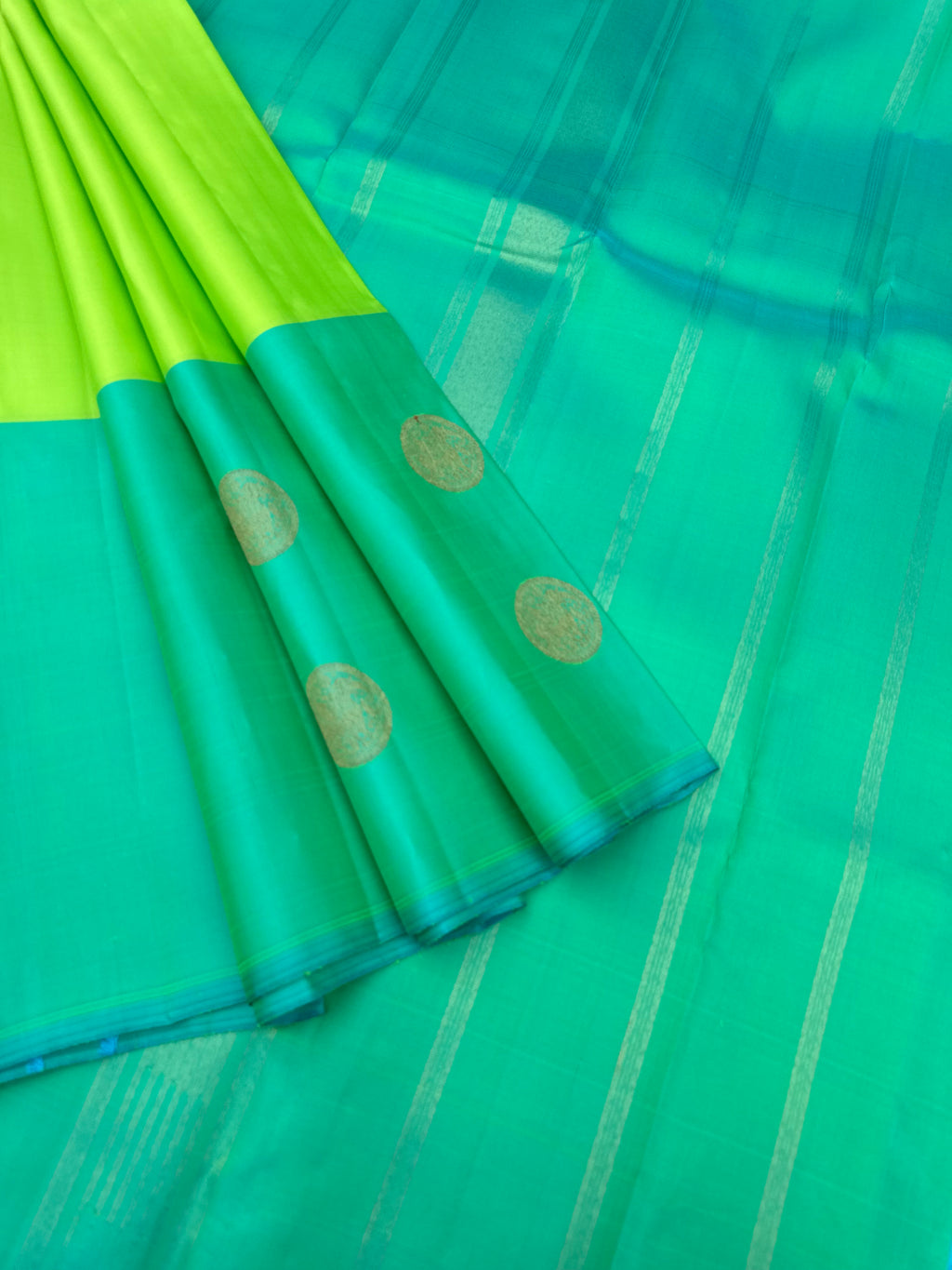 Diwali Edits - Kanchivaram For All Occasions - shocking green and dual tone aqua with one side woven broad with irruthalai pakshai woven buttas