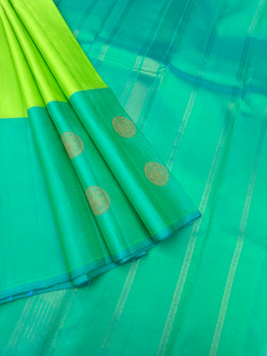Diwali Edits - Kanchivaram For All Occasions - shocking green and dual tone aqua with one side woven broad with irruthalai pakshai woven buttas