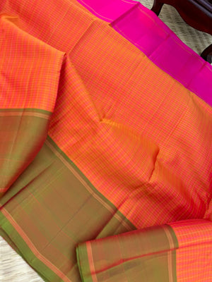 Album Untouched - a classic rust orange with short green and pink Ganga jammuna woven borders with rani pink pallu and blouse