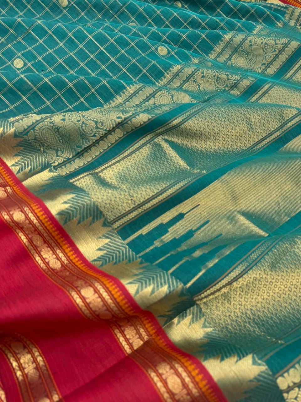 Zari Kissed Silk Cotton - unusual burnt blue with all traditional elements kattam buttas thalampoo retta pett borders