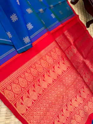 Colour Play on Kanchivaram - peacock blue green kolam buttas woven body with red tone woven pallu and blouse