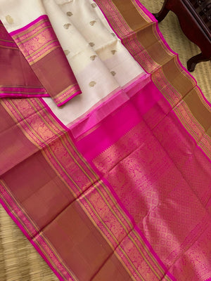 Tales of Korvais Kanchivaram - gorgeous off white and pink with broad woven borders