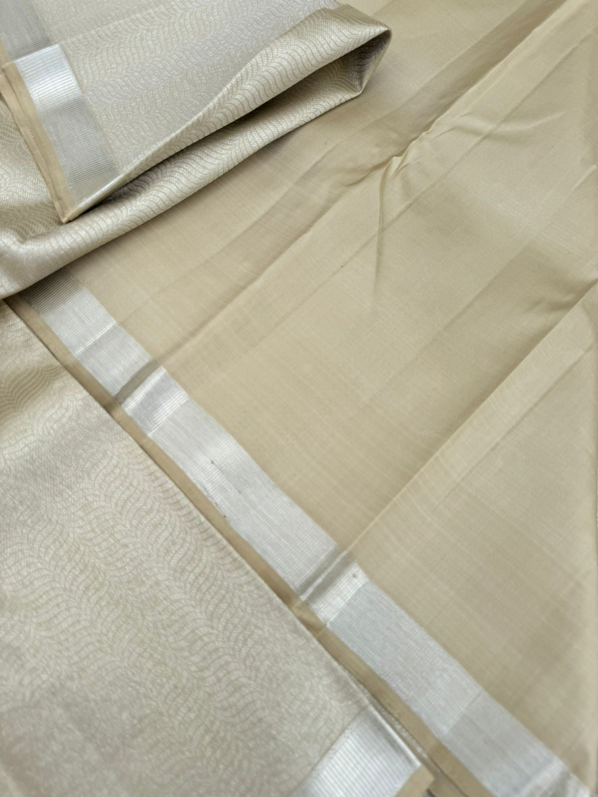Saraswathi - the beige base and full body silver zari woven Kanchivaram