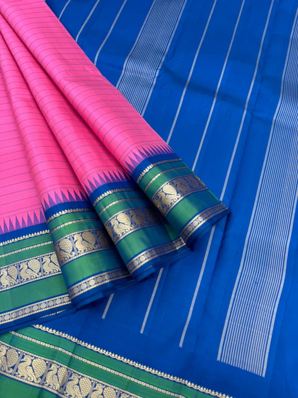 The Best of No Zari Korvai Kanchivaram - candy pink and ink blue with annapakshi woven borders with strips woven body