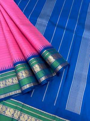 The Best of No Zari Korvai Kanchivaram - candy pink and ink blue with annapakshi woven borders with strips woven body